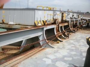 Hatch cover maintenance - Hauling wires/chains should be correctly adjusted and tensioned to avoid uneven seating and hatch cover distortion when closed.