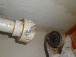 Hatch cover maintenance - Hatch coaming drain completely blocked with debris and rust.